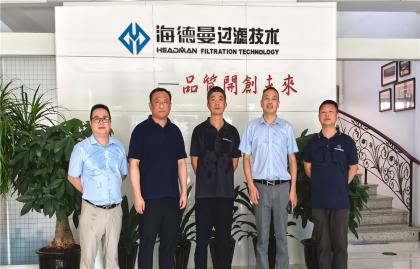 Hyundai (Jiangsu) Construction Machinery delegation visited Zhejiang Headman to explore new opportunities for filtration technology collaboration.